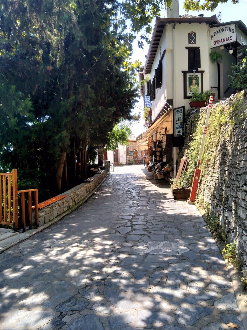 The traditional cobbled path that leads to the village square