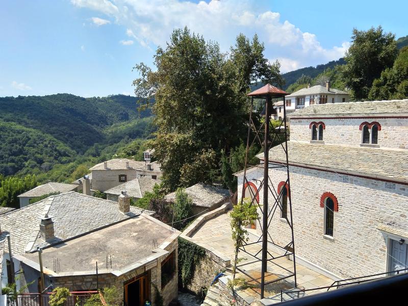 Traditional houses on the verdant slope of the village