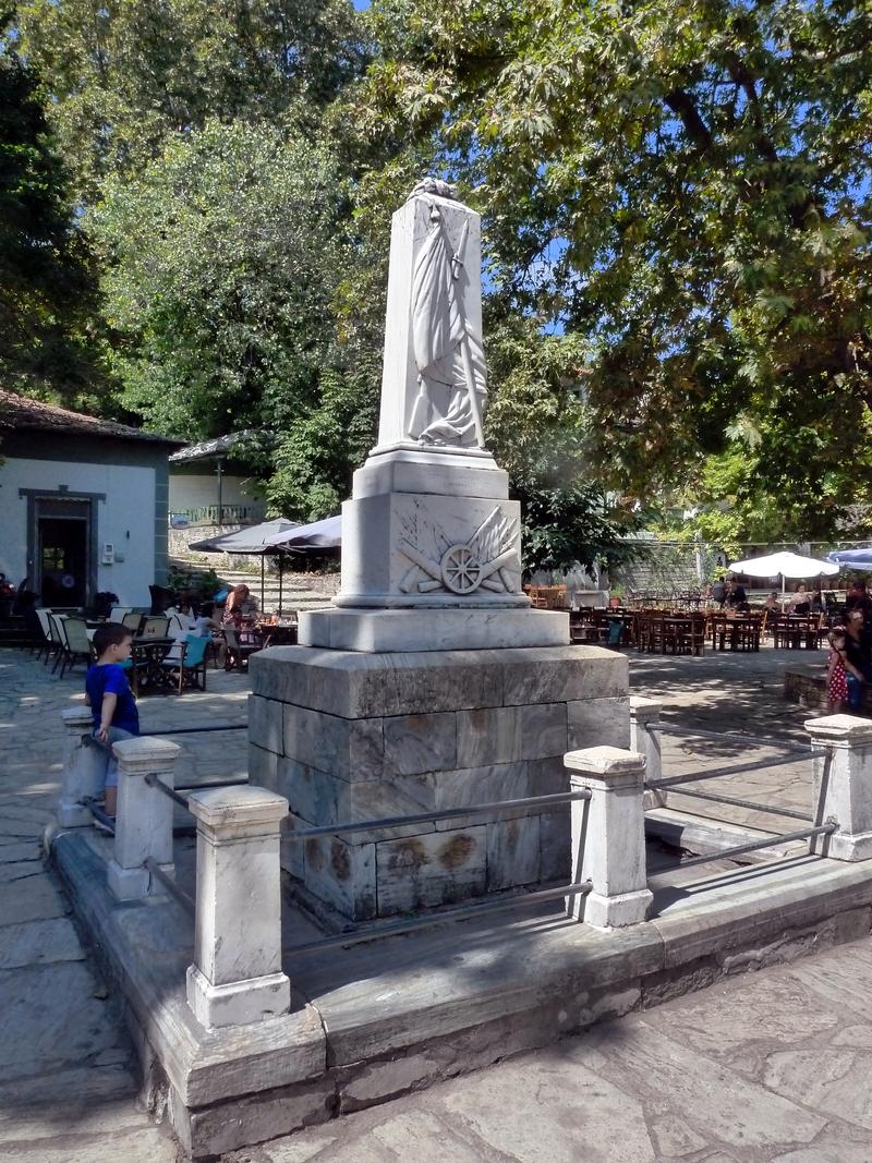 Marble monument in Agios Georgios square